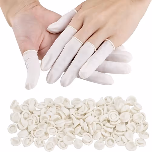 White ESD finger cots worn during precision component handling